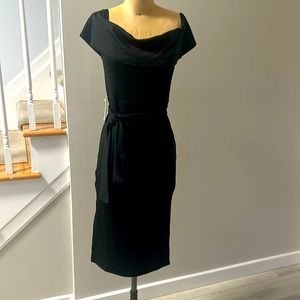 Size Medium Black off shoulder dress.  Soft machine wash and wear.